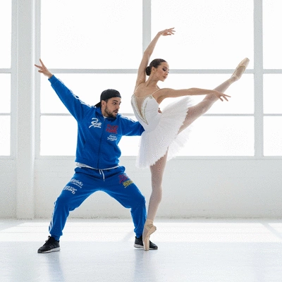 Ballerina and street dancer performing together
